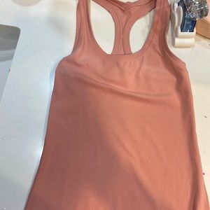 lululemon tank top! looks brownish but it’s pink! never worn it!